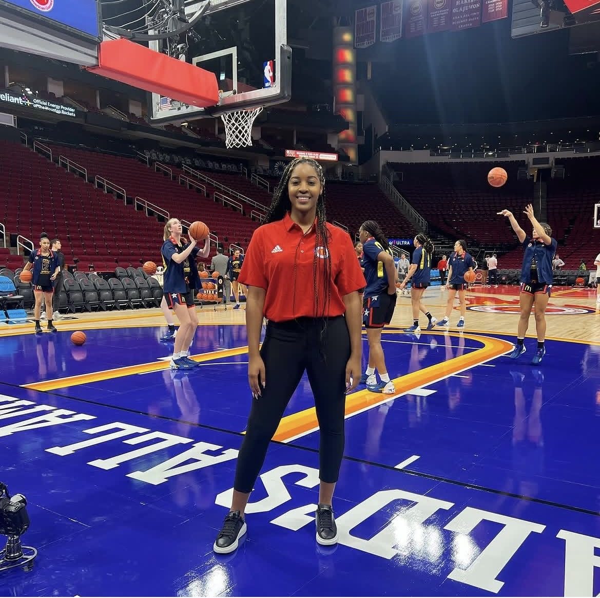 Coach Bre Workman coaching on court